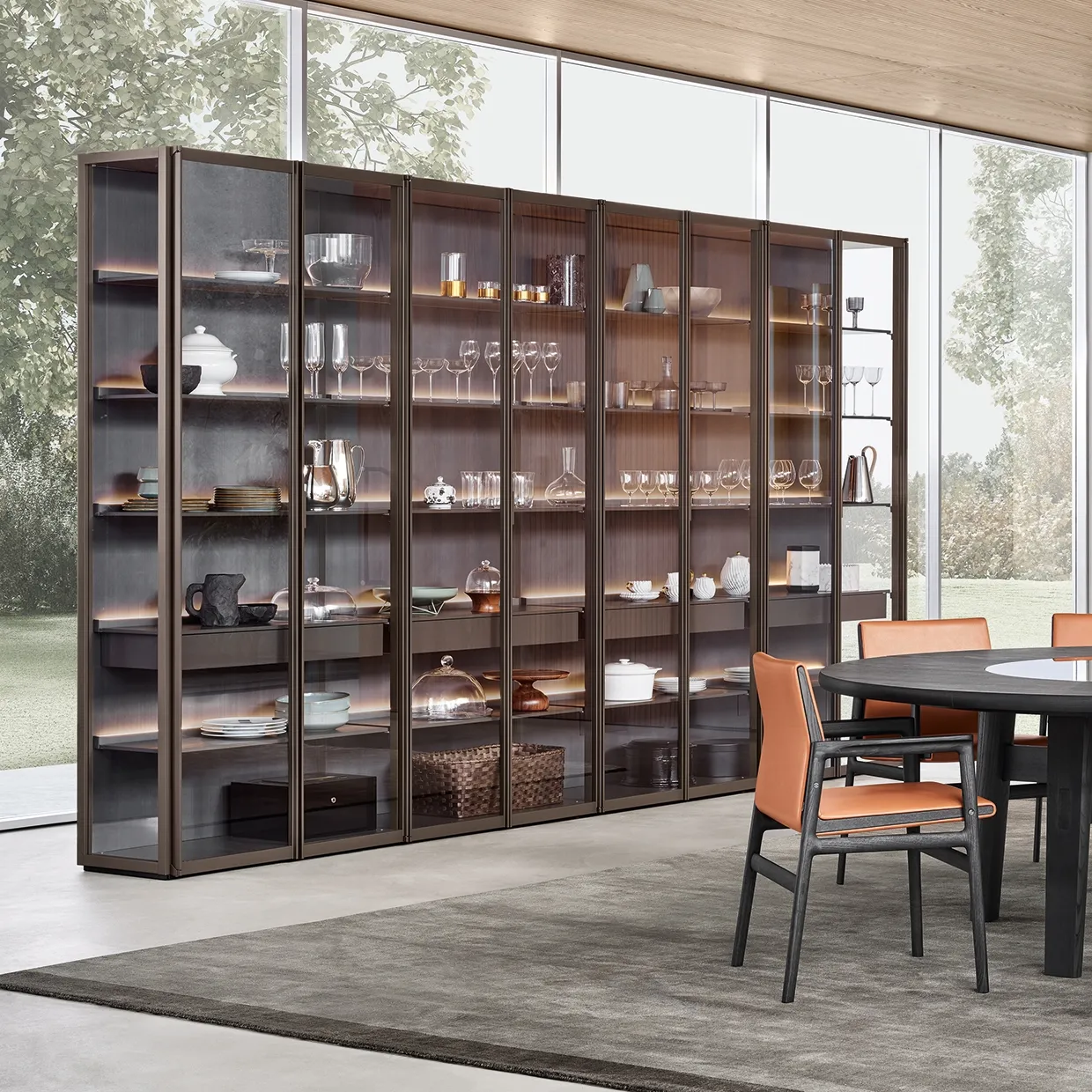 A library and study furnished with Italian shelving